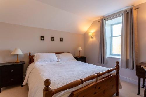 Ένα ή περισσότερα κρεβάτια σε δωμάτιο στο Tarbert Country Manor