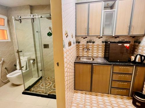 Koupelna v ubytování Farah Hotel Apartment