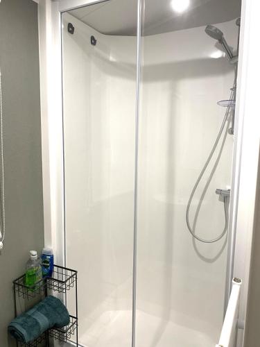 a shower with a glass door in a bathroom at BAF Luxury Stays - Billing Aquadrome - Caravan Sleeps 8 in Great Billing
