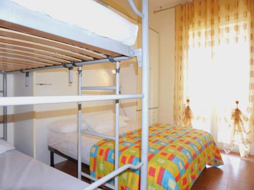 Postel nebo postele na pokoji v ubytování Apartment in Caorle near beach