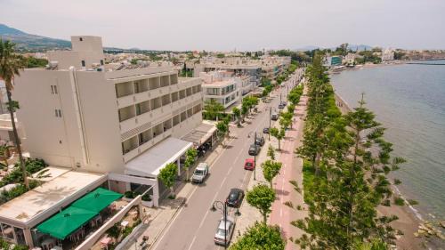 an aerial view of a street next to the water at Orpheus Studios in Kos Town