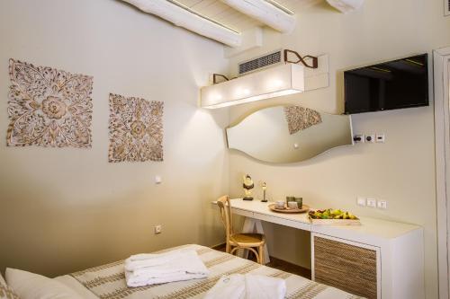 Postel nebo postele na pokoji v ubytování Sette Venti Boutique Hotel