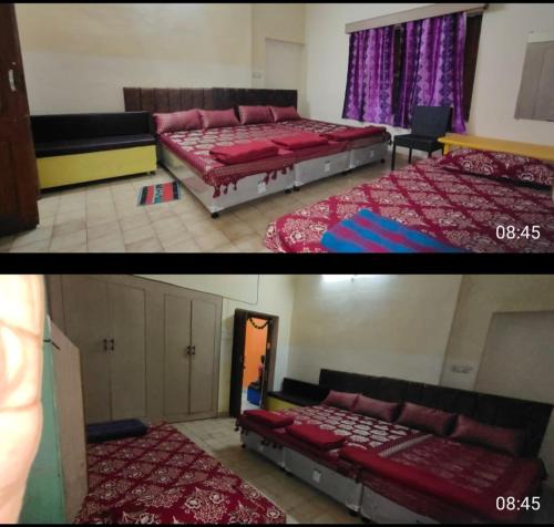 Un dormitorio con dos camas en una habitación. en Mahadevi Mataji Ashram, en Varanasi