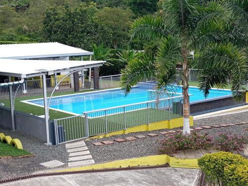 an image of a swimming pool at a resort at Alojamiento Rural San José in Cartago