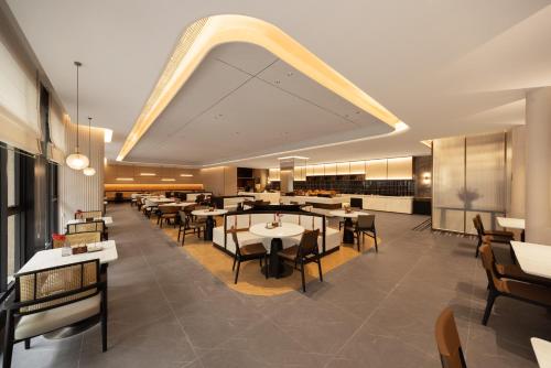 En restaurant eller et andet spisested på Atour X Hotel Xintang South Station Zengcheng District