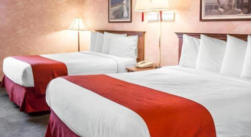 Ένα ή περισσότερα κρεβάτια σε δωμάτιο στο Econo Lodge Longmont East