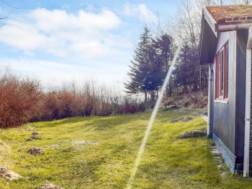 a water hose is coming out of a house at 6 person holiday home in Spøttrup-By Traum in Lihme