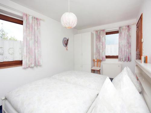 Cama ou camas em um quarto em Apartment in Stuhlfelden near Ski Lift