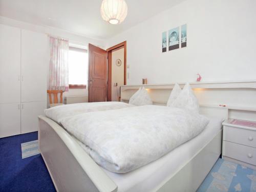 Cama ou camas em um quarto em Apartment in Stuhlfelden near Ski Lift