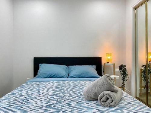 Ένα ή περισσότερα κρεβάτια σε δωμάτιο στο Upscale 6BR Villa at Birch Avenue