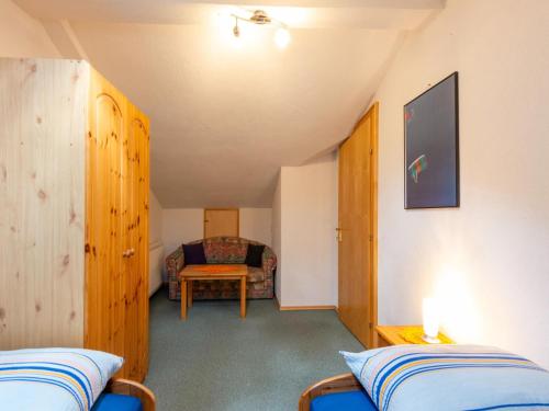 Apartment in Strengen near Ski Slopesにあるベッド