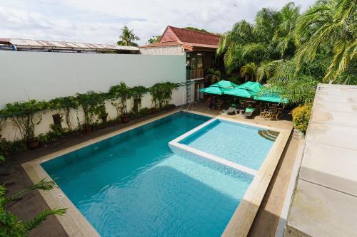 Bazén v ubytování Palawan Uno Hotel nebo v jeho okolí
