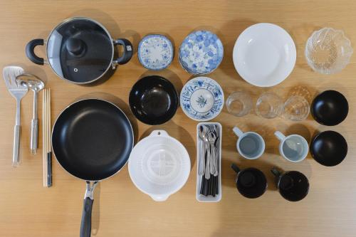 a bunch of plates and utensils on a table at 楚々Soso in Miyazu