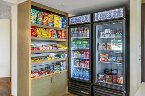a refrigerator filled with lots of food and drinks at Comfort Inn in Chatham