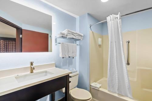 a bathroom with a sink and a toilet and a shower at Quality Inn Hixson-Chattanooga in Hixson