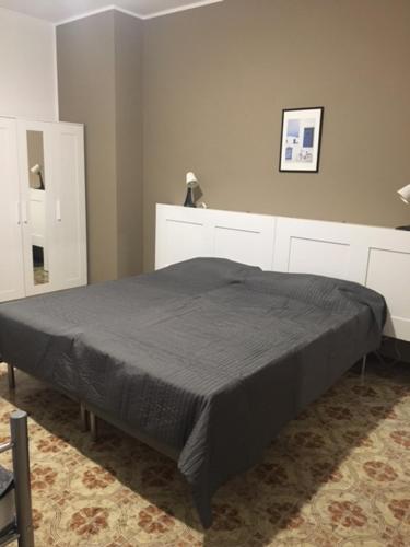 Ένα ή περισσότερα κρεβάτια σε δωμάτιο στο casa alla madonna Refrancore Monferrato- Asti