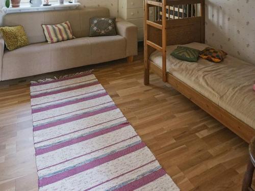 Postel nebo postele na pokoji v ubytování 5 person holiday home in KRISTINEHAMN