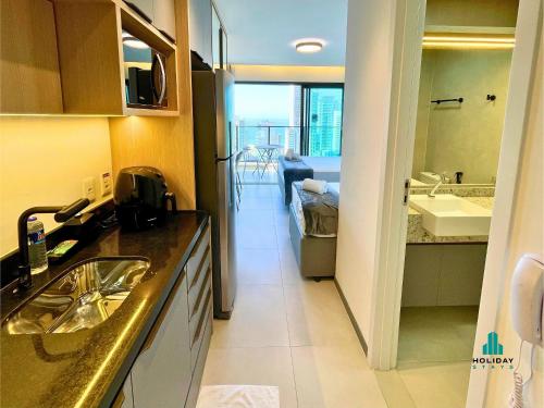 Η κουζίνα ή μικρή κουζίνα στο Beach Class Meireles by Holiday Stays
