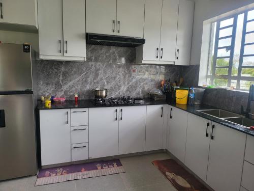 Kuchyň nebo kuchyňský kout v ubytování Le Tai Village Homestay