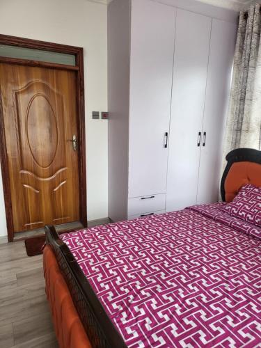 Postel nebo postele na pokoji v ubytování Le Tai Village Homestay