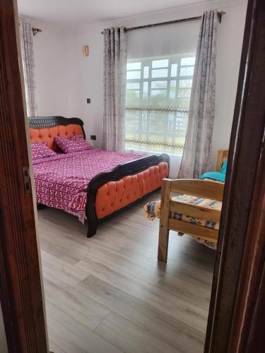 Postel nebo postele na pokoji v ubytování Le Tai Village Homestay