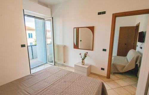 Ένα ή περισσότερα κρεβάτια σε δωμάτιο στο Residence Doral