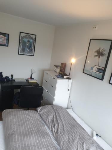 Ένα ή περισσότερα κρεβάτια σε δωμάτιο στο Modern apartment