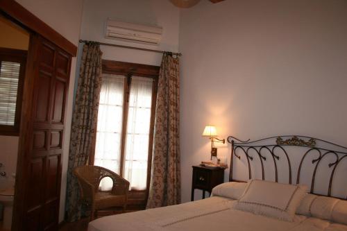 Giường trong phòng chung tại La Casona de Mahora