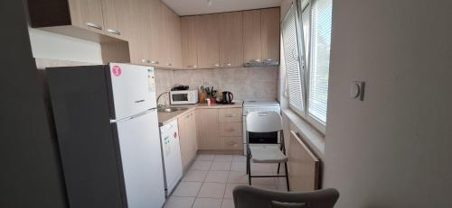 Kuchyň nebo kuchyňský kout v ubytování Newly two bedroom apartments