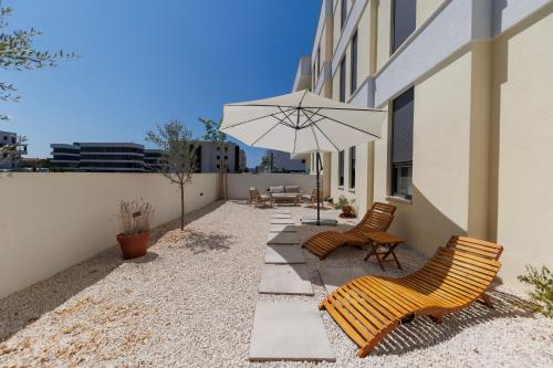 Luxury Sun Garden by Belmont Realty