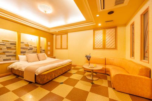 Cama o camas de una habitación en HOTEL WiLL 大高