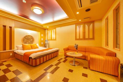 Cama o camas de una habitación en HOTEL WiLL 大高