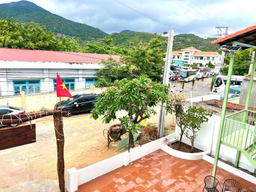 a view from the balcony of a building with a parking lot at Homestay Làng Biển in Ninh Hải