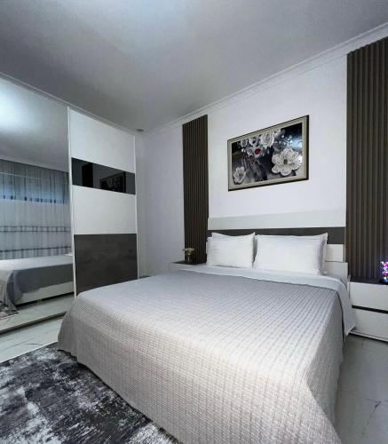 Katil atau katil-katil dalam bilik di Modern Apartment Shkoder