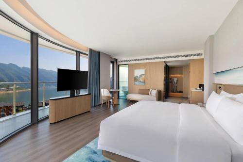 Televisyen dan/atau pusat hiburan di Wingate by Wyndham Chongqing Wushan