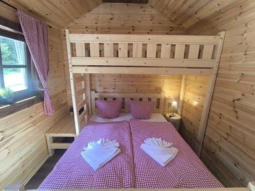 Postel nebo postele na pokoji v ubytování Hotel Džbán