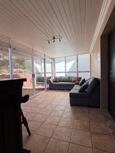 a living room with two couches and a table at 21 A on Edgerton in Freeland Park