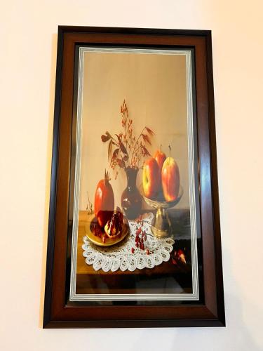 a picture of a table with a plate of fruit at Honeydream Villa & Studio Apartments in Diani Beach