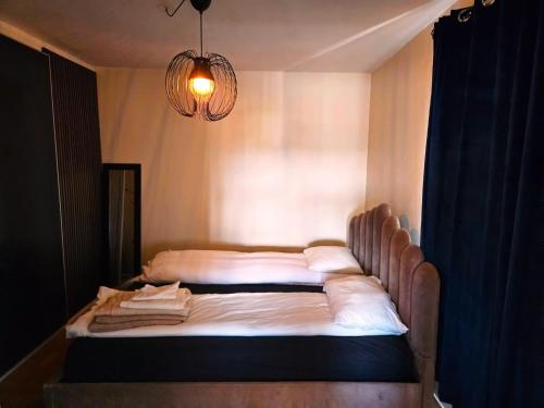 Postel nebo postele na pokoji v ubytování Top floor Helsfyr city central apartment