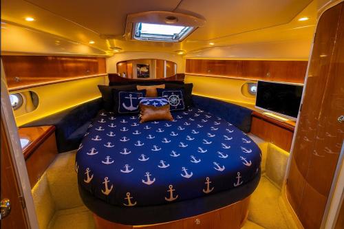 a large bed in the back of a boat at Frognerstranda - Majestic- in Oslo