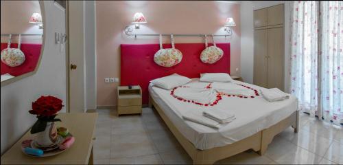 Postel nebo postele na pokoji v ubytování Hotel Viky