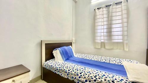 Ein Bett oder Betten in einem Zimmer der Unterkunft Waves Seafront home