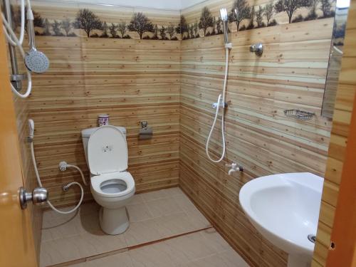 Ένα μπάνιο στο Goyambokka Peacock Guest