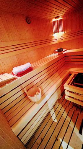 a inside of a sauna with a basket in it at Odpoczynek na wsi 