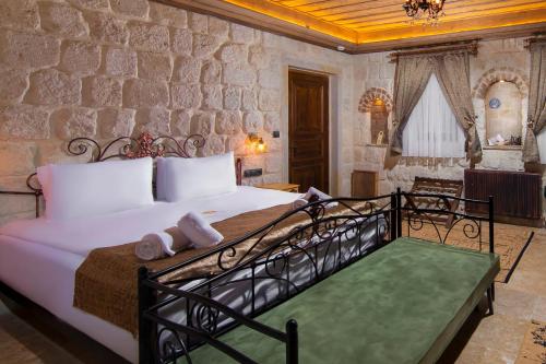Katil atau katil-katil dalam bilik di Dionysos Cave Cappadocia Hotel