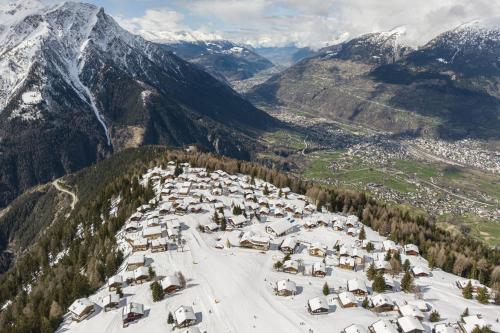 an aerial view of a ski resort in the mountains at Chalet mit Sauna an der Piste in Rosswald