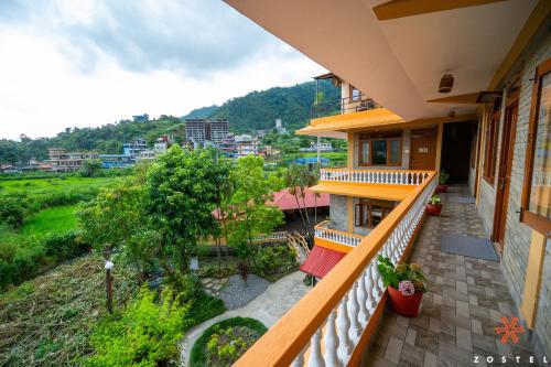 a view from the balcony of a house at Zostel Pokhara in Pokhara