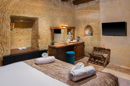 Katil atau katil-katil dalam bilik di Dionysos Cave Cappadocia Hotel