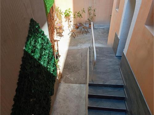 a stairway with a green hedge next to a building at Wendy House - Central Sofia - 3BRDR - Private Courtyard - 5 min to Vitosha blvd in Sofia