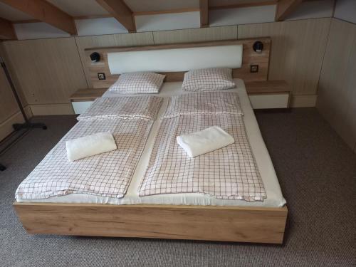 a model of a bedroom with two beds at Pokoje Gościnne Jaga in Kielce